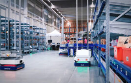 Brightpick Autopicker robots moving around autonomously in Rohlik Group's Prague warehouse.